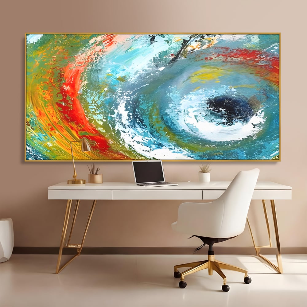 Tablou canvas cu pictura abstracta cu vartej de culori, in rama de aluminiu auriu, pe perete intr-un birou